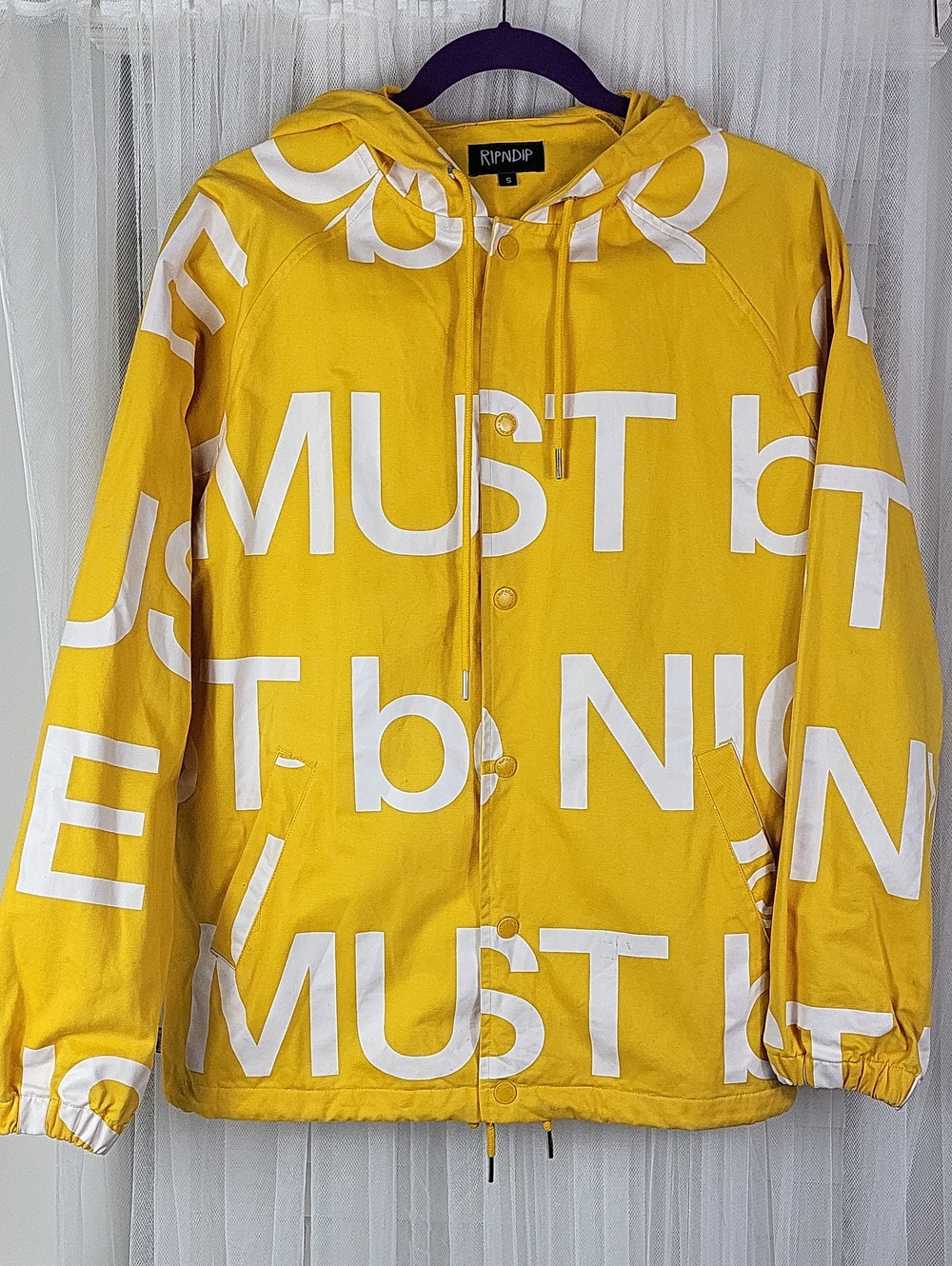RIPNDIP Yellow Graphic Hooded Rain Coat. Size S
